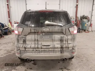 2018 Ford Escape SE with VIN 1FMCU9GD8JUA53114, listed as a IAAI auction lot 41592808 with 167,659 mi miles. Bid and sale history available at carsss.com. Image 16.