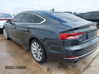 2018 Audi A5 Sportback Premium z VIN WAUANCF5XJA022221, wystawiony jako IAAI lot #42041410 z przebiegiem 94 851 mil mil oraz . Historia ofert i sprzedaży dostępna na DreamBid. Obrazek 3.