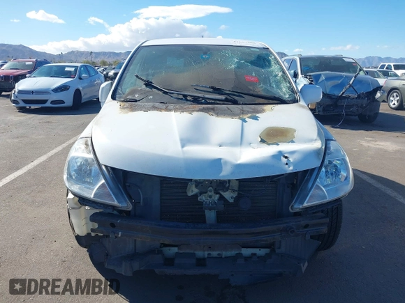 2012 Nissan Versa S with VIN 3N1BC1CP9CK246107, listed as a IAAI auction lot 41657588 with 1 mi miles. Bid and sale history available at carsss.com. Image 6.