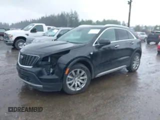 2020 Cadillac XT4 AWD Premium Luxury z VIN 1GYFZDR45LF049638, wystawiony jako IAAI lot #42216996 z przebiegiem 82 760 mil mil oraz . Historia ofert i sprzedaży dostępna na DreamBid. Obrazek 2.