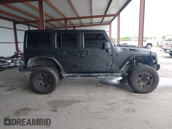 2012 Jeep Wrangler Unlimited Sport с VIN 1C4BJWDGXCL154296, выставлен на аукционе IAAI как лот 42748480 с пробегом 100 921 миль миль и . История ставок и продаж доступна на DreamBid. Изображение 13.