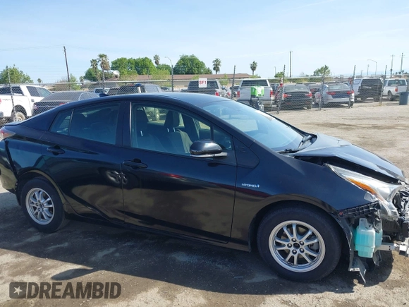 2016 Toyota Prius Two with VIN JTDKBRFU9G3021083, listed as a IAAI auction lot 41986733 with 117,227 mi miles and . Bid and sale history available at DreamBid. Image 14.