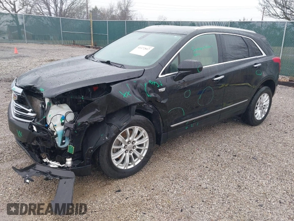 2018 Cadillac XT5 FWD with VIN 1GYKNARS6JZ160993, listed as a IAAI auction lot 41472847 with 113,415 mi miles. Bid and sale history available at carsss.com. Image 2.