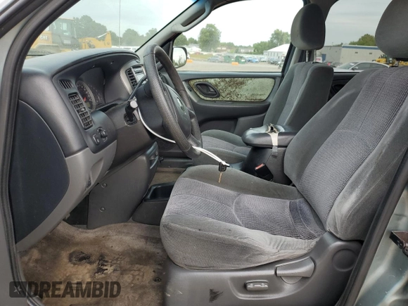 2003 Mazda Tribute LX with VIN 4F2YZ94123KM49852, listed as a Copart auction lot 71779054 with 263,938 mi miles and Salvage Title. Bid and sale history available at carsss.com. Image 7.