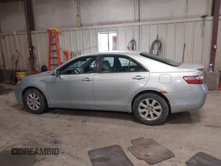 2009 Toyota Camry z VIN JTNBB46K593051519, wystawiony jako IAAI lot #41681706 z przebiegiem 158 490 mil mil oraz . Historia ofert i sprzedaży dostępna na DreamBid. Obrazek 14.