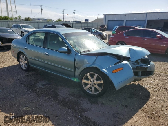 2002 Nissan Maxima GLE z VIN JN1DA31A92T302785, wystawiony jako Copart lot #57310725 z przebiegiem 95 192 mil mil oraz Szkoda całkowita • Salvage title. Historia ofert i sprzedaży dostępna na DreamBid. Obrazek 4.