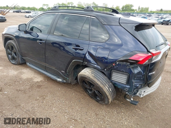 2021 Toyota RAV4 Hybrid XSE with VIN 4T3E6RFV0MU053245, listed as a IAAI auction lot 42426959 with 28,717 mi miles and . Bid and sale history available at DreamBid. Image 3.