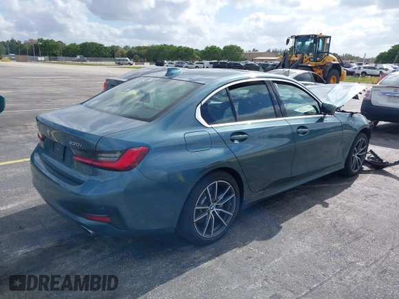 2020 BMW 3 Series 330i xDrive with VIN 3MW5R7J03L8B09157, listed as a IAAI auction lot 39168393 with 69,052 mi miles. Bid and sale history available at carsss.com. Image 4.