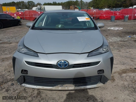 2021 Toyota Prius L Eco with VIN JTDKAMFU1M3152848, listed as a IAAI auction lot 41600212 with 140,114 mi miles. Bid and sale history available at carsss.com. Image 11.