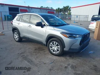 2022 Toyota Corolla Cross L with VIN 7MUAAAAG6NV010688, listed as a IAAI auction lot 41212520 with 50,075 mi miles and . Bid and sale history available at DreamBid. Image 1.
