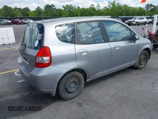 2008 Honda Fit with VIN JHMGD38438S030619, listed as a IAAI auction lot 42010052 with 147,588 mi miles. Bid and sale history available at carsss.com. Image 4.