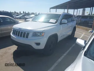 2014 Jeep Grand Cherokee Laredo with VIN 1C4RJFAG9EC334021, listed as a IAAI auction lot 42128823 with 161,741 mi miles. Bid and sale history available at carsss.com. Image 17.