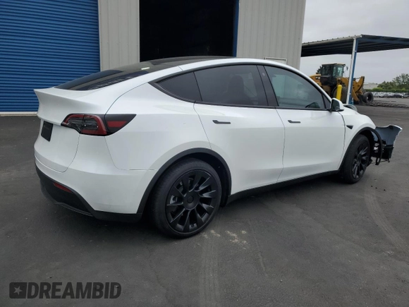 2023 Tesla Model Y Long Range with VIN 7SAYGDEEXPF744472, listed as a Copart auction lot 54109315 with 15,404 mi miles and Salvage Title. Bid and sale history available at DreamBid. Image 3.