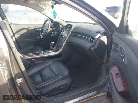 2013 Chevrolet Malibu LTZ with VIN 1G11H5SA9DF150247, listed as a IAAI auction lot 41376113 with 190,498 mi miles and . Bid and sale history available at DreamBid. Image 5.