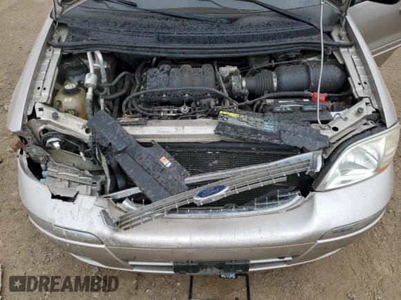 2003 Ford Windstar SE with VIN 2FMDA52413BB59104, listed as a Copart auction lot 55134805 with 132,918 mi miles and Salvage title. Bid and sale history available at DreamBid. Image 12.