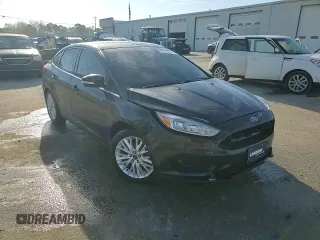 2016 Ford Focus Titanium with VIN 1FADP3J22GL201721, listed as a Copart auction lot 50633795 with 29,801 mi miles and Salvage title. Bid and sale history available at DreamBid. Image 14.