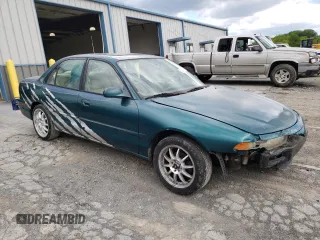 1997 Mitsubishi Galant ES z VIN 4A3AJ56G5VE019296, wystawiony jako Copart lot #56047635 z przebiegiem 87 533 mil mil oraz Szkoda całkowita • Salvage title. Historia ofert i sprzedaży dostępna na DreamBid. Obrazek 4.