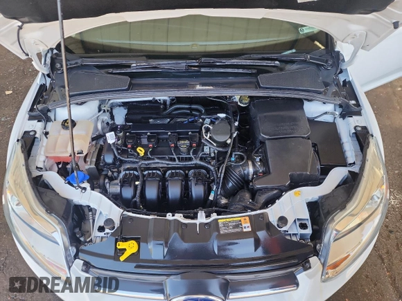 2014 Ford Focus SE with VIN 1FADP3F24EL221250, listed as a Copart auction lot 52379245 with 52,883 mi miles and Salvage Title. Bid and sale history available at DreamBid. Image 11.