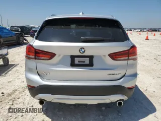 2021 BMW X1 sDrive28i z VIN WBXJG7C04M5T32801, wystawiony jako Copart lot #52046425 z przebiegiem 45 584 mil mil oraz Szkody całkowita. Historia ofert i sprzedaży dostępna na DreamBid. Obrazek 6.
