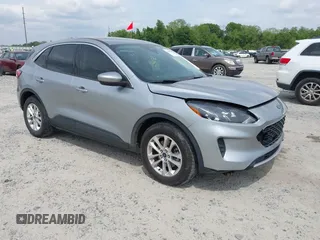 2021 Ford Escape SE z VIN 1FMCU0G67MUA99969, wystawiony jako IAAI lot #42085819 z przebiegiem 57 221 mil mil oraz . Historia ofert i sprzedaży dostępna na DreamBid. Obrazek 1.
