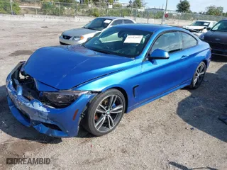 2015 BMW 4 Series 435i with VIN WBA3R1C56FK193975, listed as a IAAI auction lot 41293103 with 102,188 mi miles. Bid and sale history available at carsss.com. Image 2.