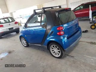 2008 Smart fortwo Pure with VIN WMEEJ31X28K123879, listed as a IAAI auction lot 42258663 with 93,056 mi miles and . Bid and sale history available at DreamBid. Image 3.