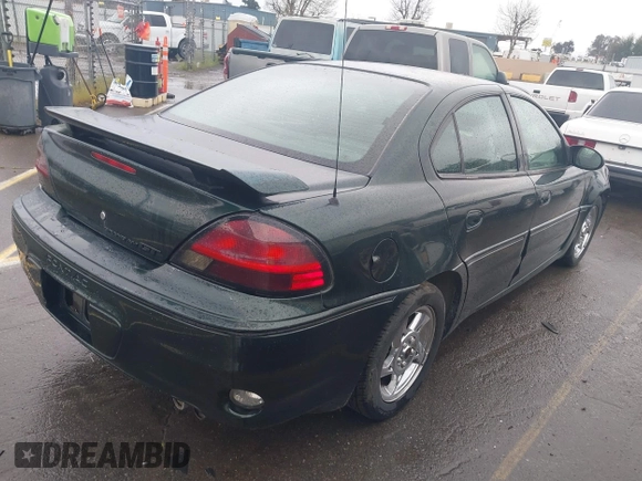 2003 Pontiac Grand Am GT1 with VIN 1G2NV52EX3C164442, listed as a IAAI auction lot 41772380 with 150,134 mi miles. Bid and sale history available at carsss.com. Image 4.