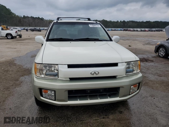 2003 Infiniti QX4 with VIN JNRDR09X83W251941, listed as a Copart auction lot 71044774 with 162,214 mi miles and Salvage Title. Bid and sale history available at DreamBid. Image 5.