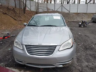 2014 Chrysler 200 Touring with VIN 1C3CCBBB1EN165049, listed as a IAAI auction lot 42005572 with 117,673 mi miles and . Bid and sale history available at carsss.com. Image 13.