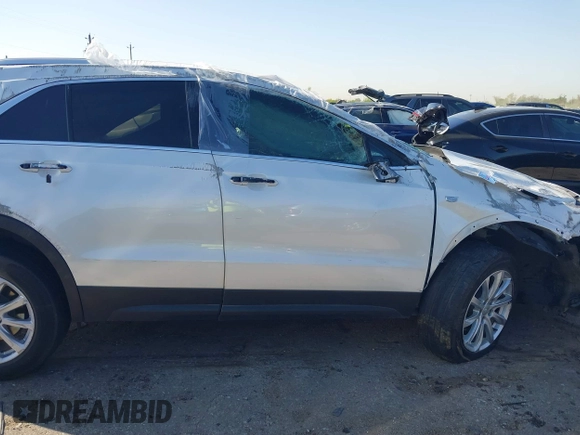 2022 Cadillac XT4 FWD Luxury with VIN 1GYAZAR48NF170949, listed as a IAAI auction lot 41857671 with 25,881 mi miles and . Bid and sale history available at carsss.com. Image 13.