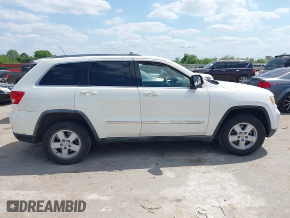 2011 Jeep Grand Cherokee 70th Anniversary with VIN 1J4RR4GG4BC562003, listed as a IAAI auction lot 42022419 with 231,786 mi miles. Bid and sale history available at carsss.com. Image 13.