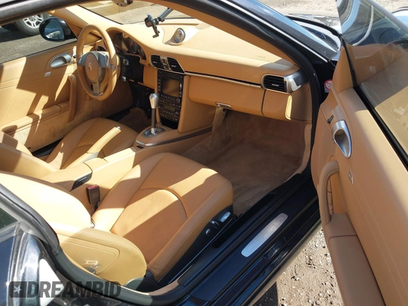 2009 Porsche 911 Carrera S with VIN WP0AB29979S721350, listed as a IAAI auction lot 39058934 with 44,352 mi miles. Bid and sale history available at carsss.com. Image 5.