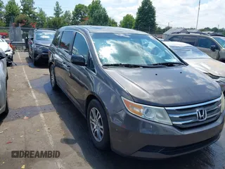 2012 Honda Odyssey EX-L z VIN 5FNRL5H67CB105175, wystawiony jako IAAI lot #42699254 z przebiegiem 222 927 mil mil oraz . Historia ofert i sprzedaży dostępna na DreamBid. Obrazek 1.
