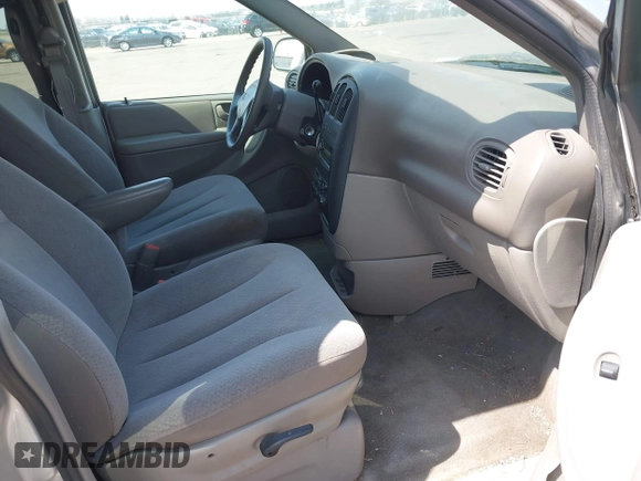 2003 Dodge Grand Caravan with VIN 2D4GP44303R281610, listed as a IAAI auction lot 42053641 with 196,877 mi miles and . Bid and sale history available at DreamBid. Image 5.