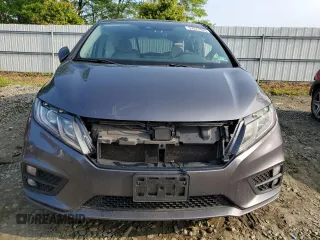 2019 Honda Odyssey EX with VIN 5FNRL6H58KB013889, listed as a Copart auction lot 57077025 with 126,467 mi miles and Salvage title. Bid and sale history available at DreamBid. Image 5.
