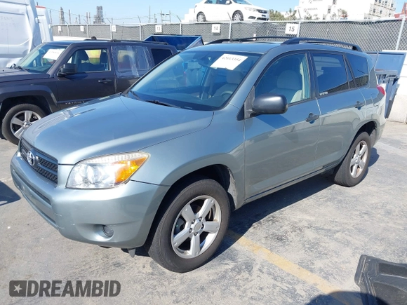 2006 Toyota RAV4 with VIN JTMZD33V465012121, listed as a IAAI auction lot 42013354 with 214,726 mi miles. Bid and sale history available at carsss.com. Image 2.
