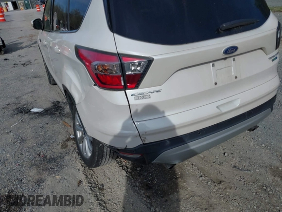 2017 Ford Escape Titanium with VIN 1FMCU9JD9HUB40135, listed as a IAAI auction lot 42054533 with 68,255 mi miles. Bid and sale history available at carsss.com. Image 17.