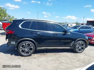 2023 BMW X5 sDrive40i with VIN 5UXCR4C07P9P72263, listed as a IAAI auction lot 41884954 with 34,233 mi miles. Bid and sale history available at carsss.com. Image 13.