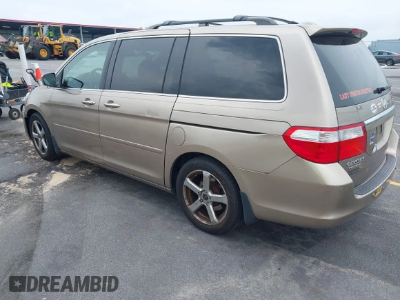 2007 Honda Odyssey Touring z VIN 5FNRL38867B076568, wystawiony jako IAAI lot #42355334 z przebiegiem 211 726 mil mil oraz . Historia ofert i sprzedaży dostępna na DreamBid. Obrazek 3.