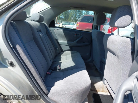 2000 Toyota Camry CE z VIN JT2BG22K6Y0451632, wystawiony jako IAAI lot #42030842 z przebiegiem 200 734 mil mil oraz . Historia ofert i sprzedaży dostępna na DreamBid. Obrazek 8.