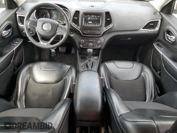 2020 Jeep Cherokee Latitude Plus with VIN 1C4PJLLB0LD653676, listed as a Copart auction lot 55921075 with 98,997 mi miles and Salvage title. Bid and sale history available at DreamBid. Image 8.