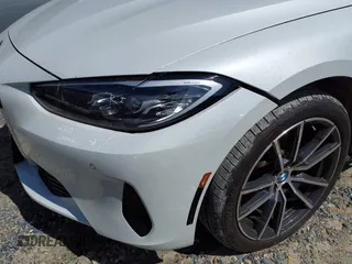 2022 BMW 4 Series 430i xDrive with VIN WBA73AP09NCJ28175, listed as a IAAI auction lot 41486064 with 27,312 mi miles and . Bid and sale history available at DreamBid. Image 19.