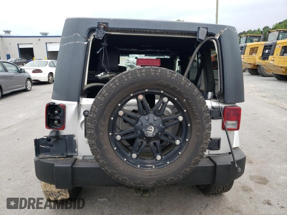 2007 Jeep Wrangler Unlimited Sahara с VIN 1J4GA591X7L158014, выставлен на аукционе Copart как лот 55201105 с пробегом 162 797 миль миль и Списание • Salvage title. История ставок и продаж доступна на DreamBid. Изображение 6.