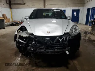 2014 Porsche Cayenne с VIN WP1AA2A21ELA00526, выставлен на аукционе Copart как лот 54238525 с пробегом 101 437 миль миль и Списание • Salvage title. История ставок и продаж доступна на DreamBid. Изображение 5.