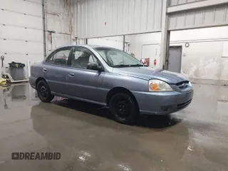 2003 Kia Rio with VIN KNADC125536274171, listed as a IAAI auction lot 41986369 with 59,837 mi miles. Bid and sale history available at carsss.com. Image 1.