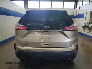 2020 Ford Edge SE с VIN 2FMPK4G94LBA07908, выставлен на аукционе Copart как лот 59572605 с пробегом 110 989 миль миль и Списание • Salvage title. История ставок и продаж доступна на DreamBid. Изображение 6.