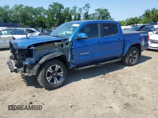 2016 Toyota Tacoma SR with VIN 3TMCZ5AN7GM023227, listed as a Copart auction lot 62693465 with 82,828 mi miles and Salvage title. Bid and sale history available at DreamBid. Image 1.