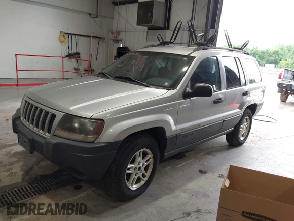 2004 Jeep Grand Cherokee Laredo with VIN 1J4GW48S44C161864, listed as a IAAI auction lot 42764536 with 143,833 mi miles and . Bid and sale history available at DreamBid. Image 2.