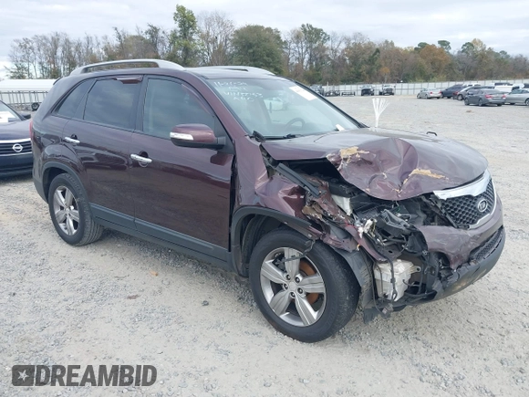 2013 Kia Sorento EX with VIN 5XYKU4A21DG312753, listed as a IAAI auction lot 41033124 with 197,459 mi miles and . Bid and sale history available at carsss.com. Image 1.