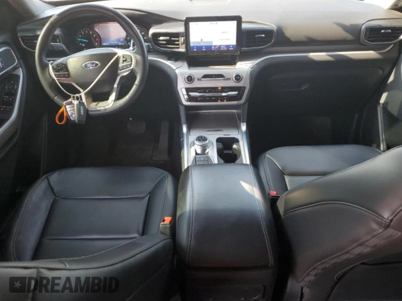 2023 Ford Explorer XLT with VIN 1FMSK8DH7PGB08372, listed as a Copart auction lot 62395205 with 63,257 mi miles and Salvage title. Bid and sale history available at DreamBid. Image 8.